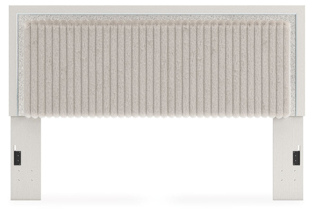 Upholstered panel headboard with corded tufted bottom edge and vertical texture