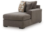 Gray right-arm corner chaise with tall backrest and patterned accent pillow