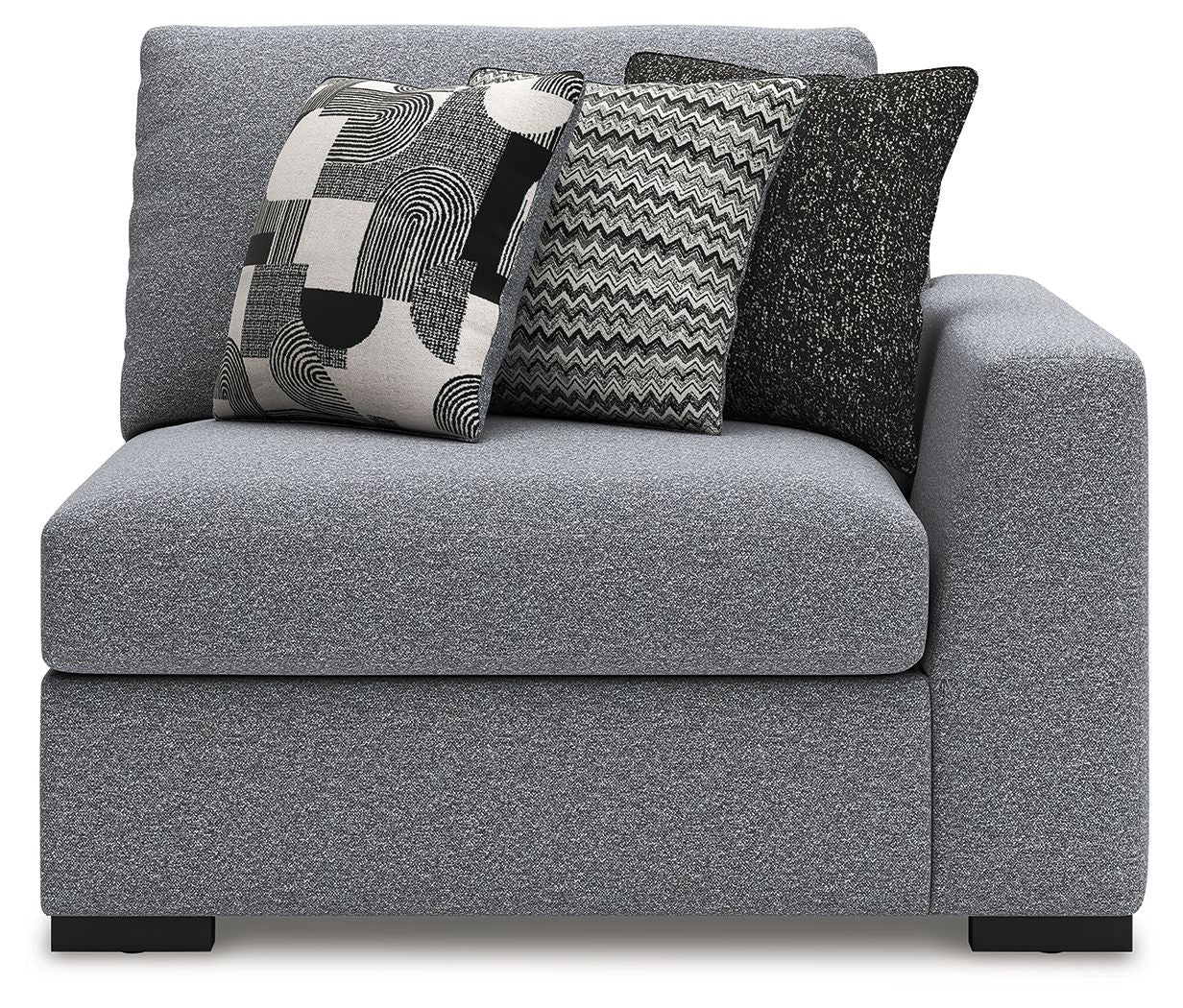Gray corner accent chair with supportive armrests and two patterned decorative pillows