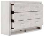 White dresser with mirror, side view showing interior of partially open drawers