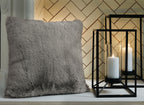 Gray faux fur pillow, square with plush shag texture.