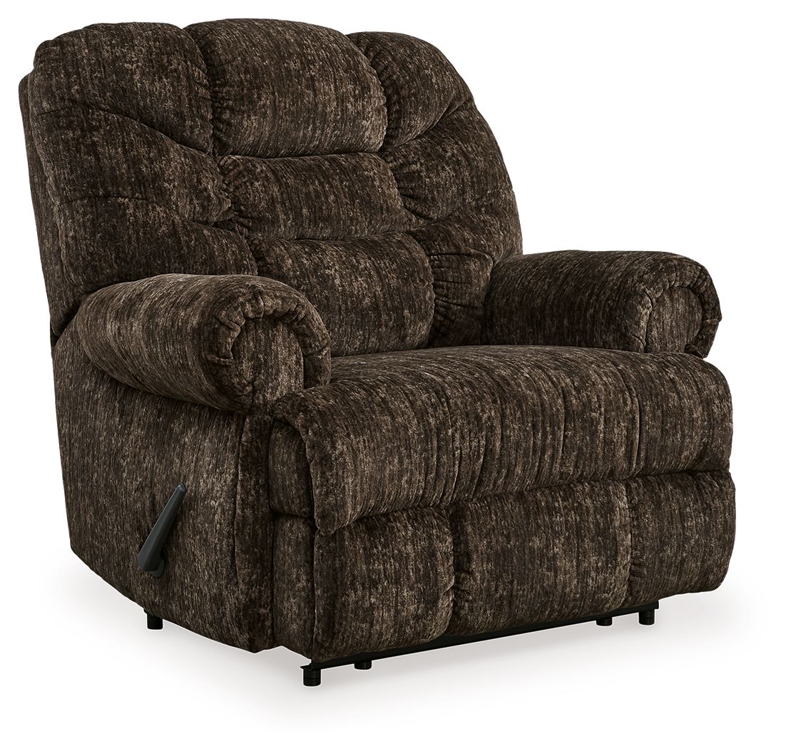 Chocolate brown fabric wall recliner chair with tufted back, arms, and sturdy base
