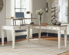 L-shaped lift-top desk with white base and brown tabletop, open center panel and drawers
