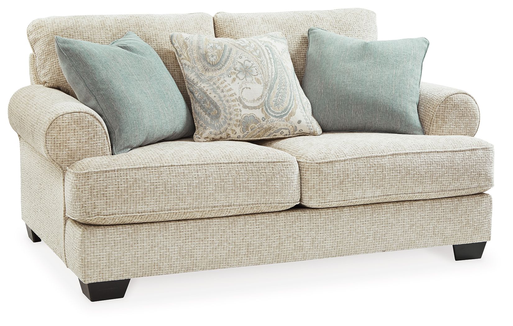 Sandstone loveseat angled view with teal accent pillows, patterned center cushion, and dark legs