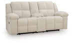 Reclining loveseat with console, light beige fabric, cushioned seat and armrests