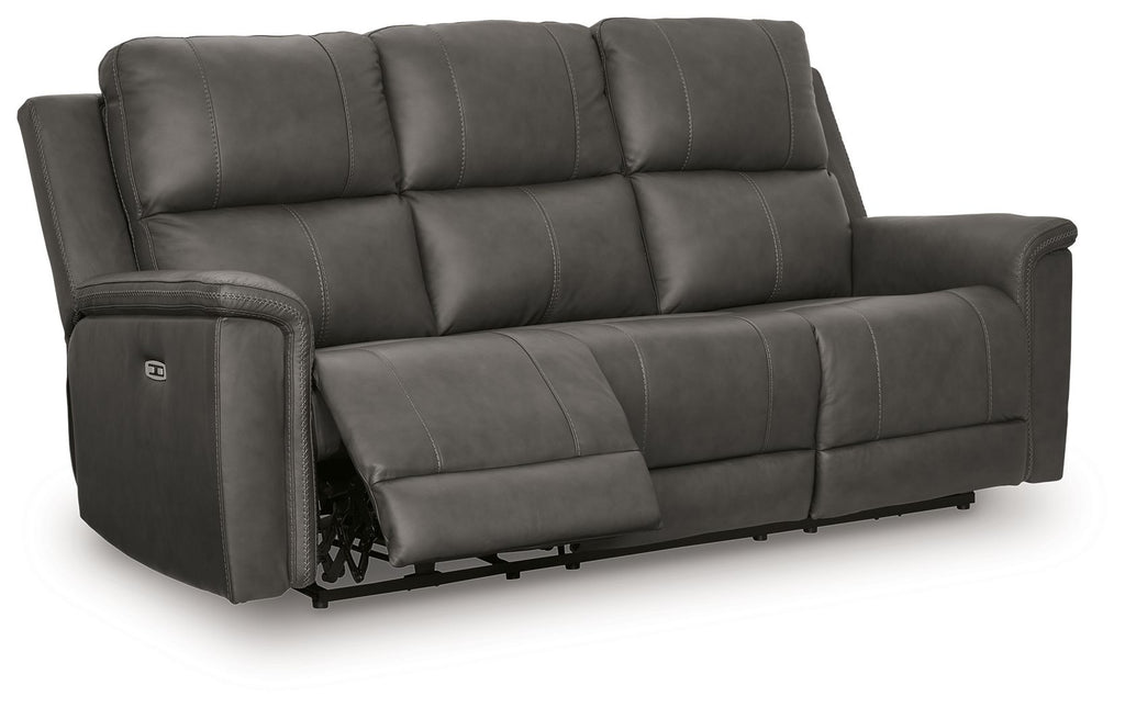 Dark gray power reclining sofa with padded armrests and adjustable headrests