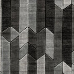 Dark gray and light gray geometric area rug with vertical zigzag block pattern