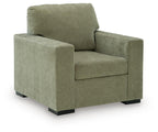 Moss green upholstered armchair with square arms and cushioned seat
