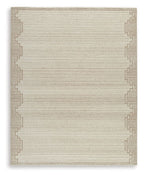 Beige rug with raised geometric edging around the perimeter