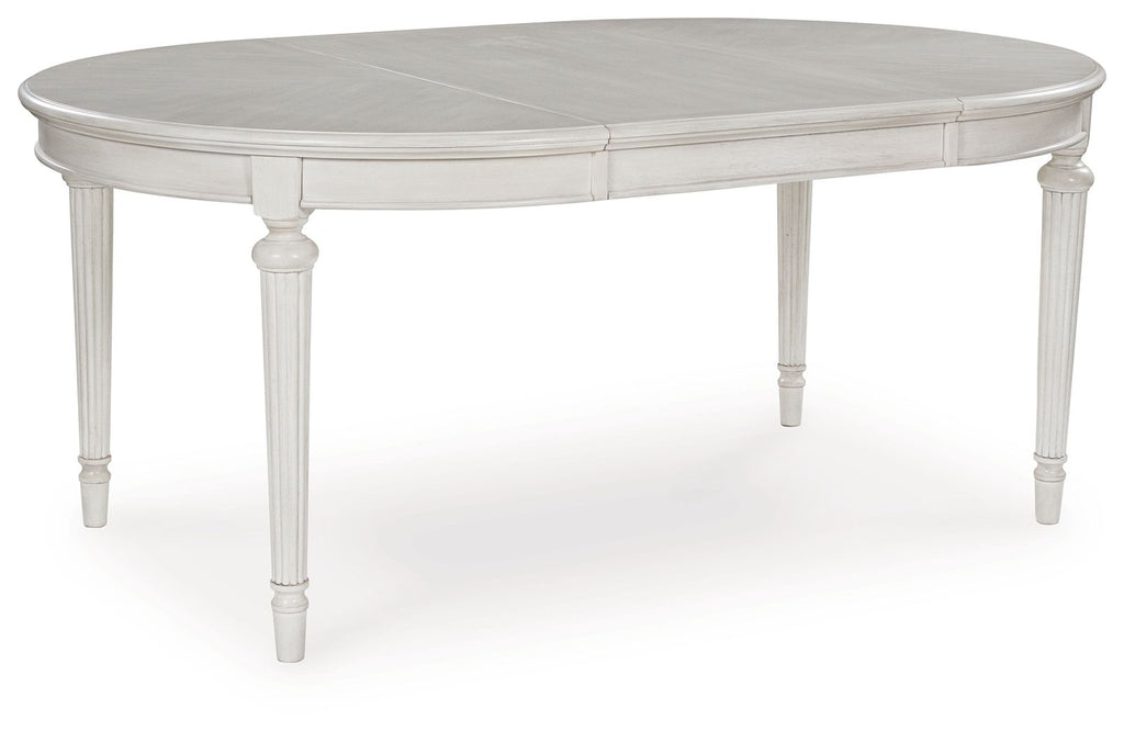 Antique white oval dining extension table with curved top and turned legs