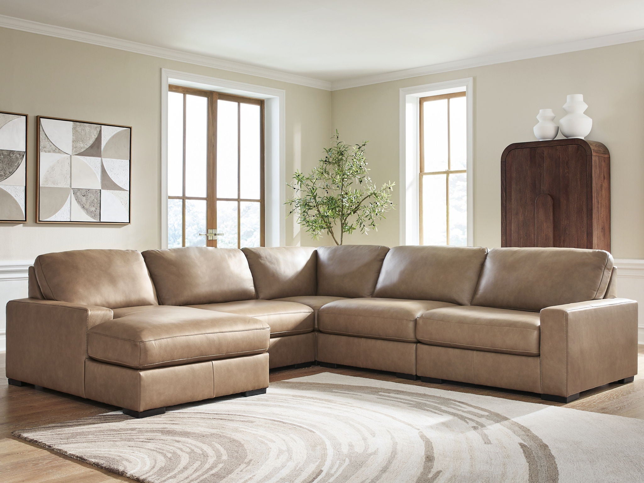 Corner sectional sofa with chaise extensions in taupe fabric, square arms and low base