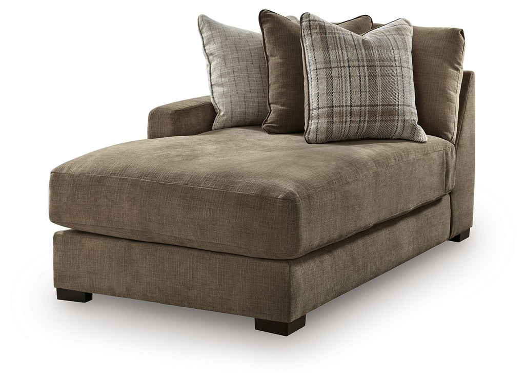 Corner chaise with square arms, medium-brown upholstered seat, and four decorative pillows