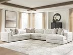 Beige sectional sofa with corner chaise and stacked throw pillows