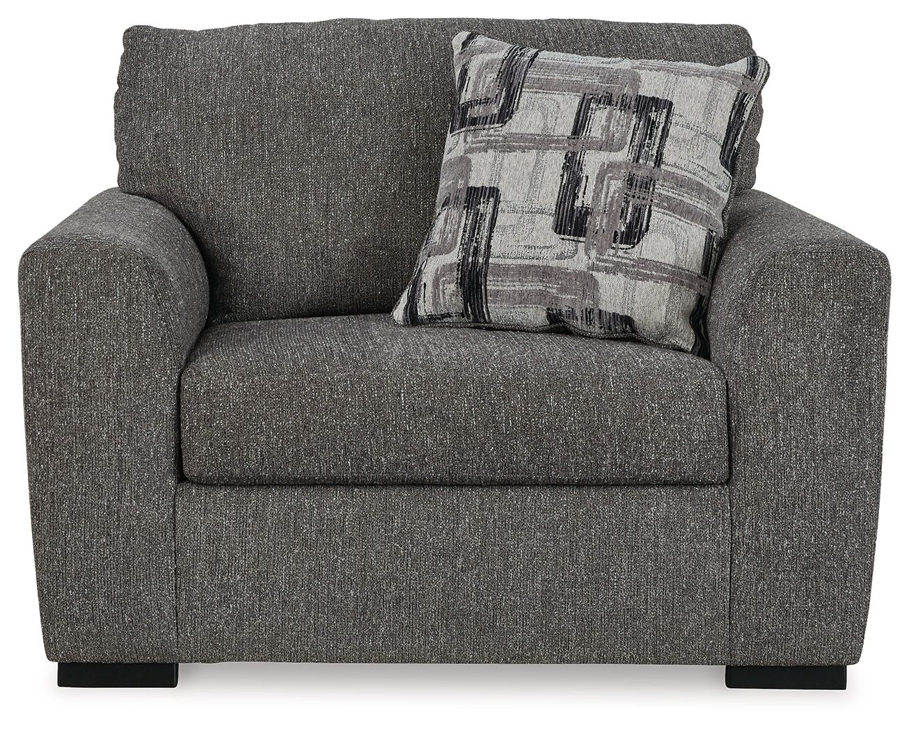 Gray chair and a half with patterned lumbar pillow, rolled arms, and thick padded seat