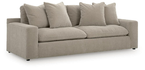 Light gray fabric sofa with three seat cushions and five back pillows, square arms