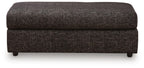 Oversized accent ottoman, dark textured fabric, rectangular top and low legs