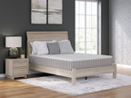 Medium mattress with quilted white top and gray vertical side panels
