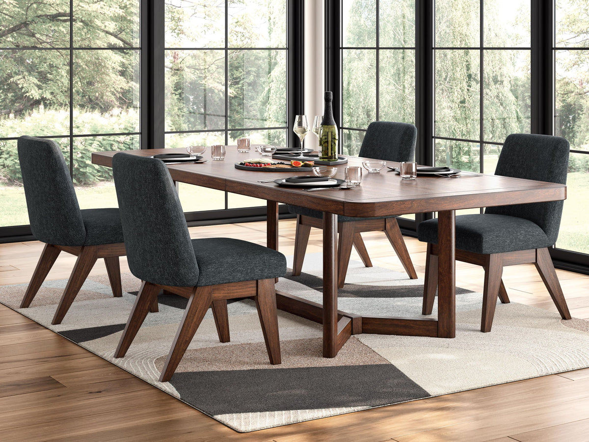 Dining table set in dark brown with four dark gray upholstered chairs and rug