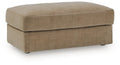Honey-beige fabric ottoman with padded hinged seat and square sides