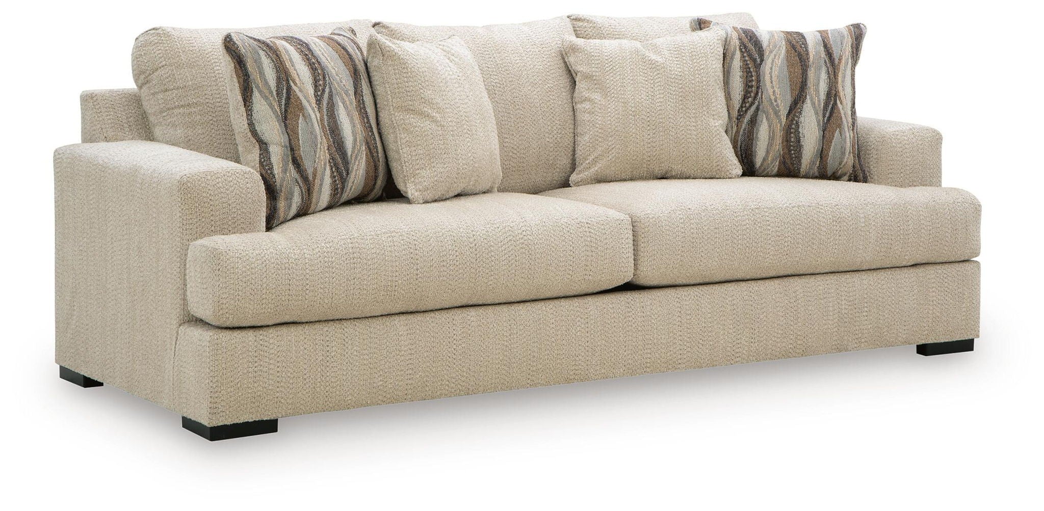 Beige upholstered sofa with two seat cushions and striped throw pillows
