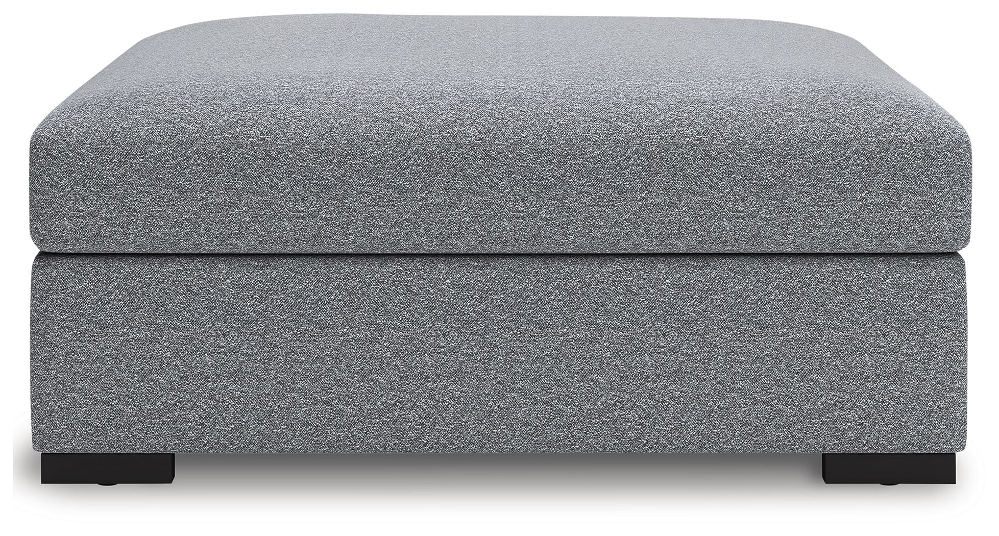 Oversized accent ottoman in salt-and-pepper upholstery, rounded top, short block legs