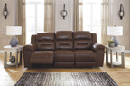 Brown reclining sofa set with padded headrests and plush armrests