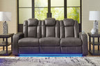 Dark gray reclining living room set recliner sofa with tufted back and blue-lit base