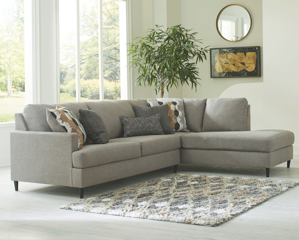 Granite gray fabric sectional sofa with chaise, wide arms, and layered back cushions