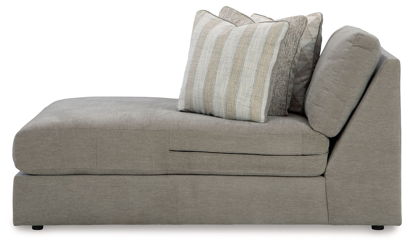 Ash gray corner chaise with tufted seat and striped and textured throw pillows