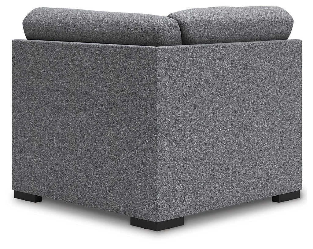 Upholstered wedge armchair with gray fabric and block legs