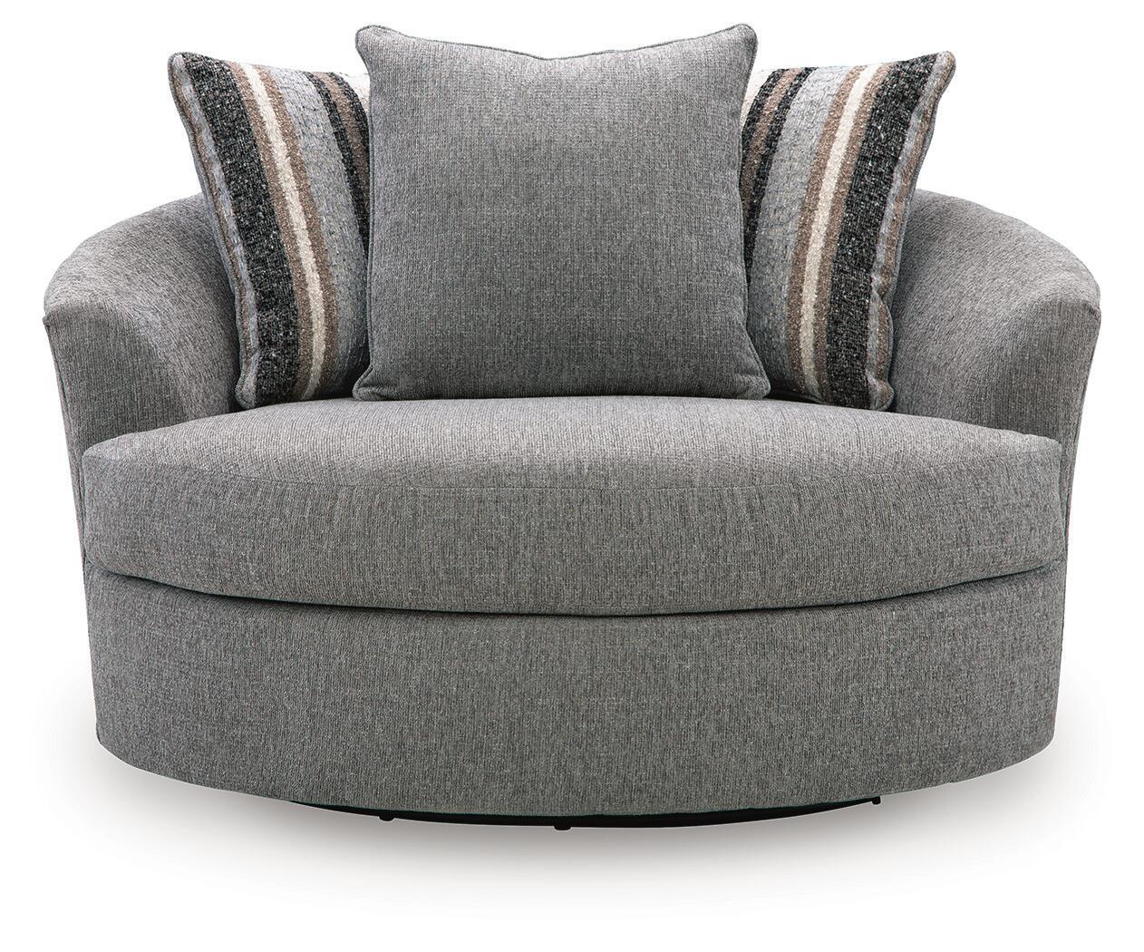 Gray oversized swivel accent chair with central back cushion and striped side pillows
