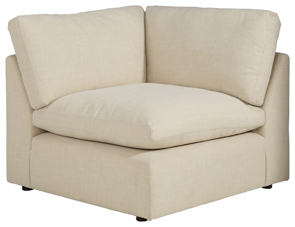 Linen wedge armchair in light beige with rounded arms and back cushions