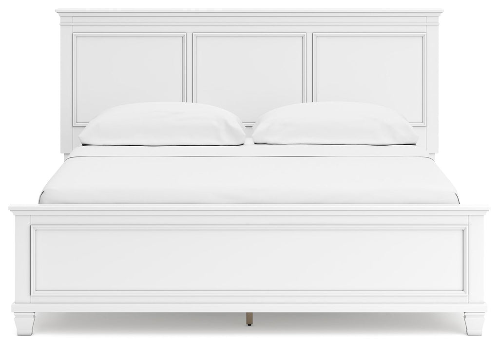 White panel bed front view with two cushions and paneled headboard behind.