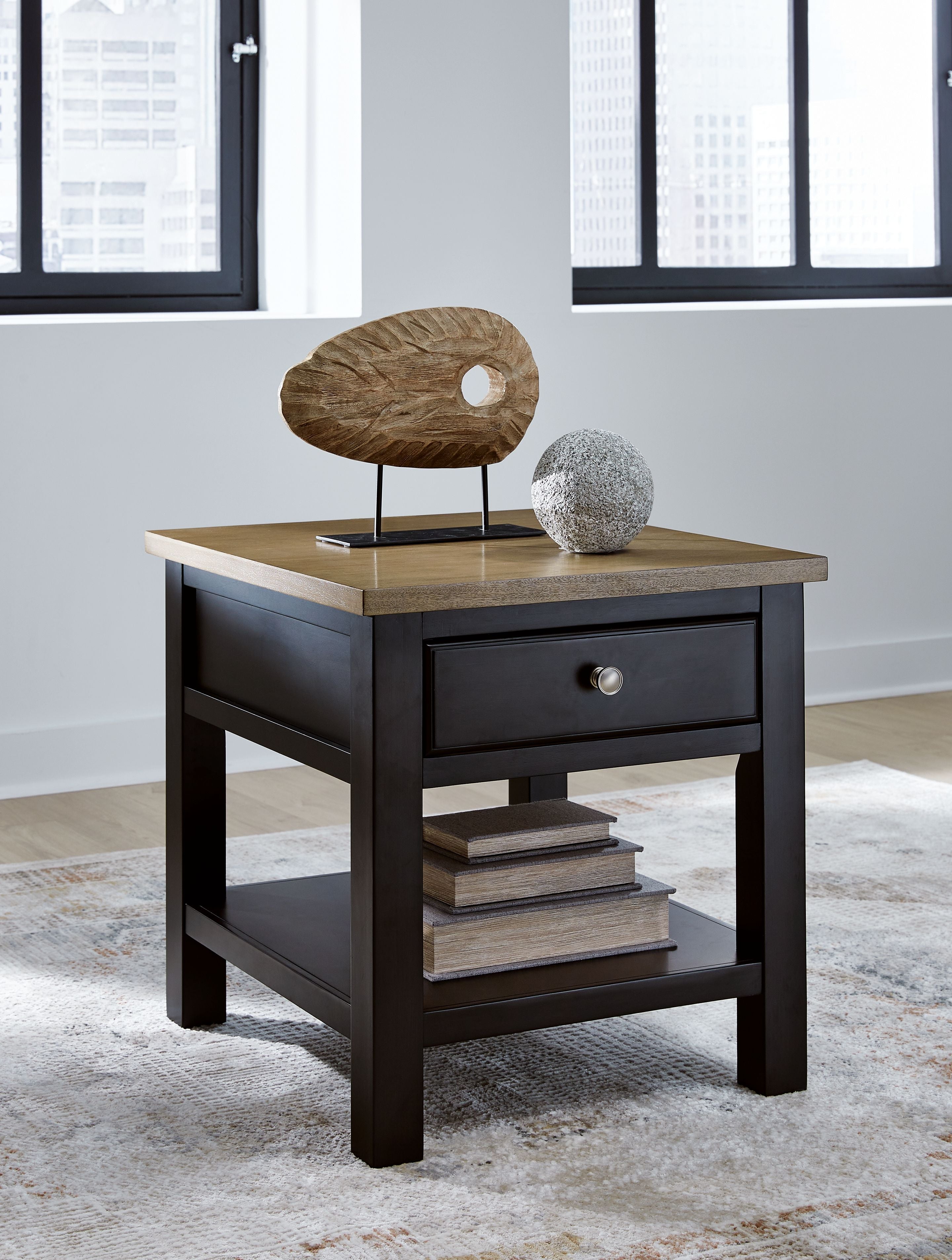 Brown rectangular end table with drawer and lower shelf, styled with small decor on top.