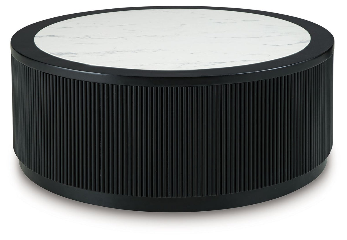 Black ribbed round table with marble-look top and dark banded base