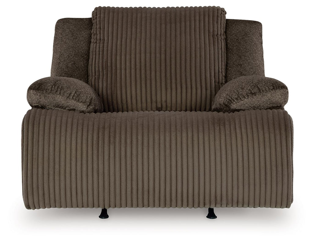 Chocolate rocker recliner chair with ribbed seat, tall back, and padded arm rests