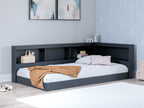 Blue bookcase storage bed with white mattress and pillow, built-in shelving