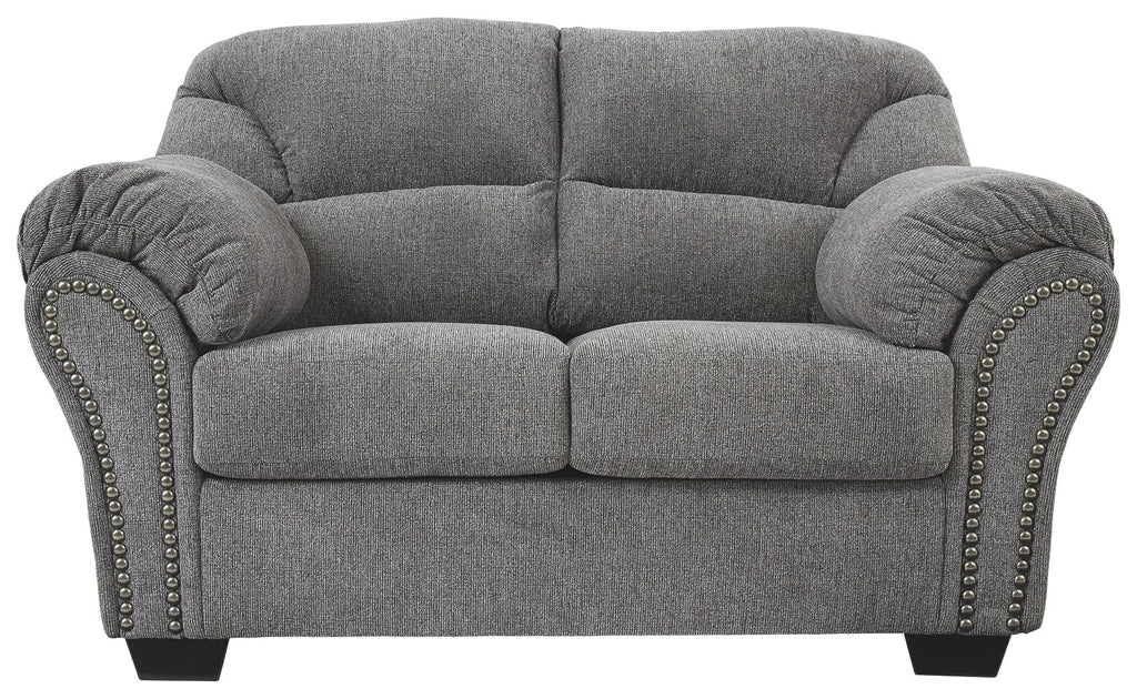 Pewter gray loveseat front view with two seat cushions and studded arm borders