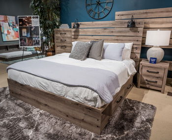 Brown gray wooden bed frame with side storage rails and upholstered headboard