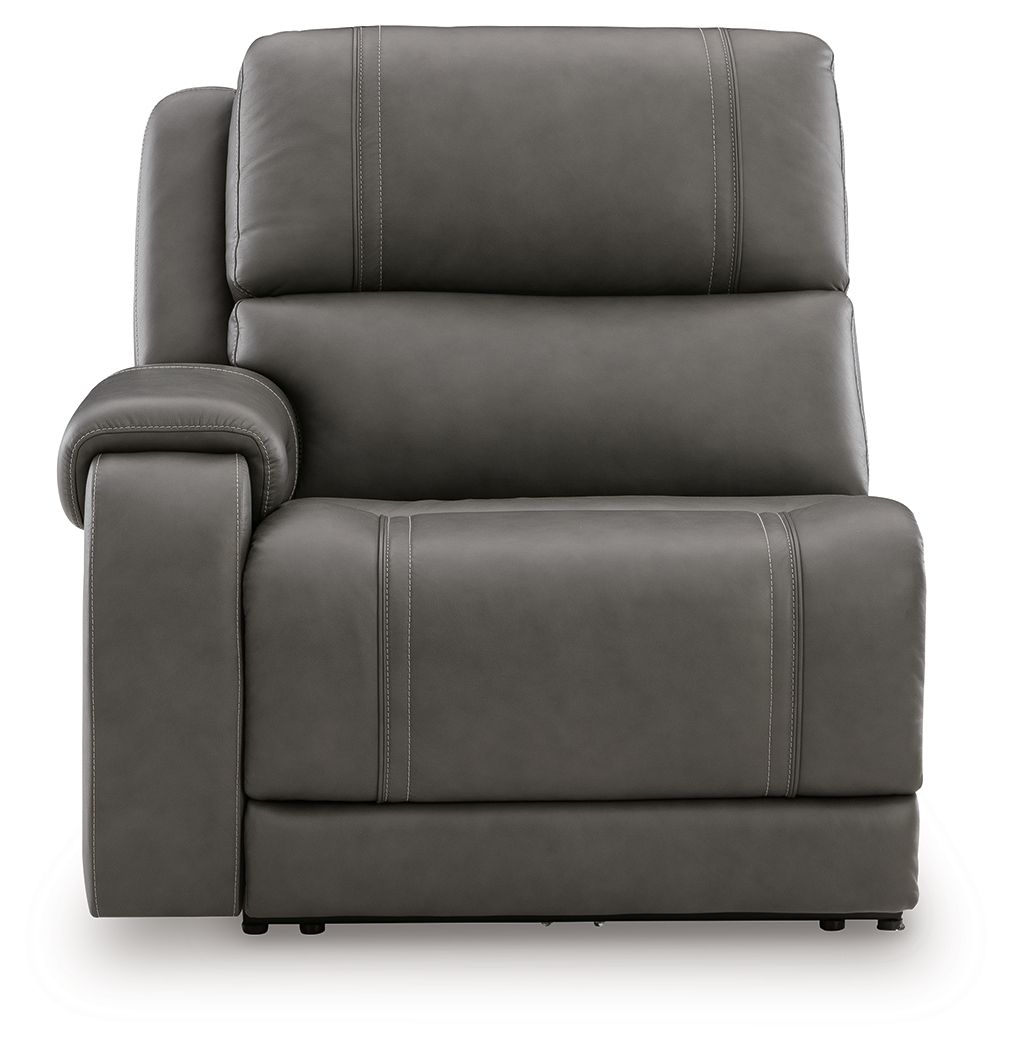 Power recliner in dark gray, tall back cushion and padded armrests with stitching