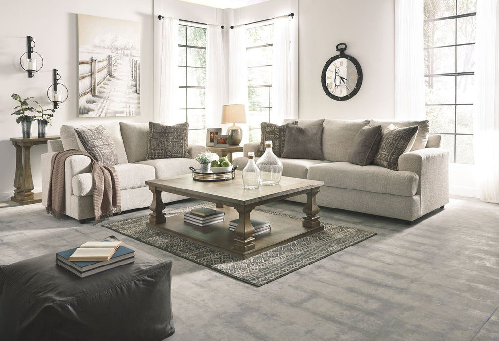 Stone upholstered sofa and loveseat set with matching throw pillows
