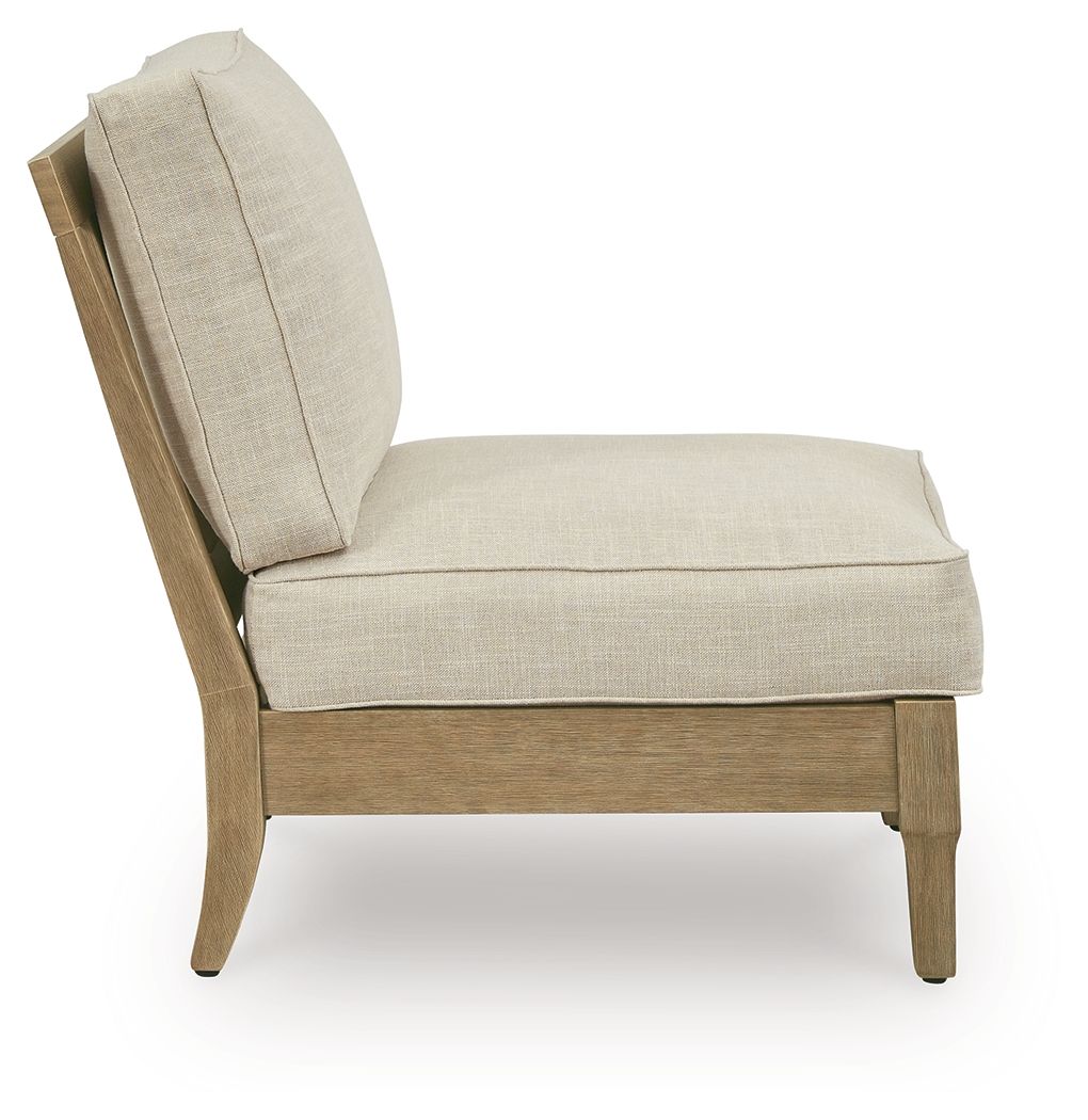 Beige armless chair with padded back and seat, light wood frame.