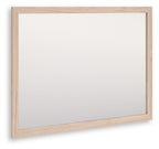 Tan wood-framed rectangular bedroom mirror, angled view with clear glass