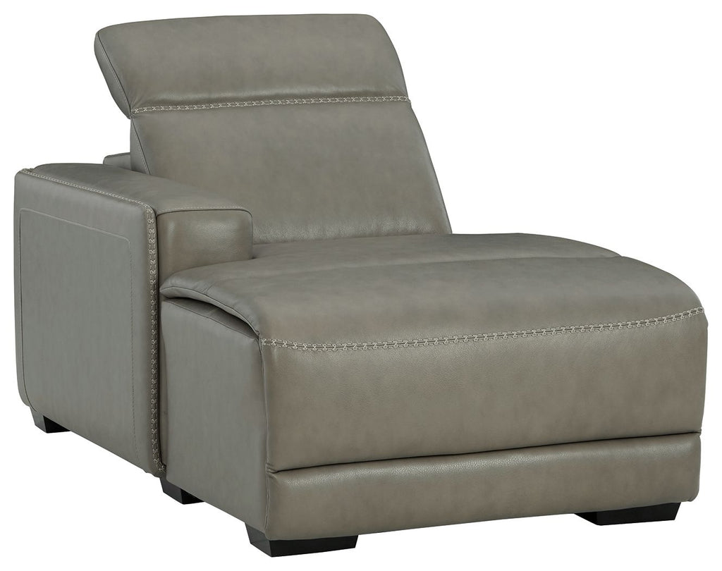 Gray upholstered reclining back chaise chair with stitched cushions and armrest