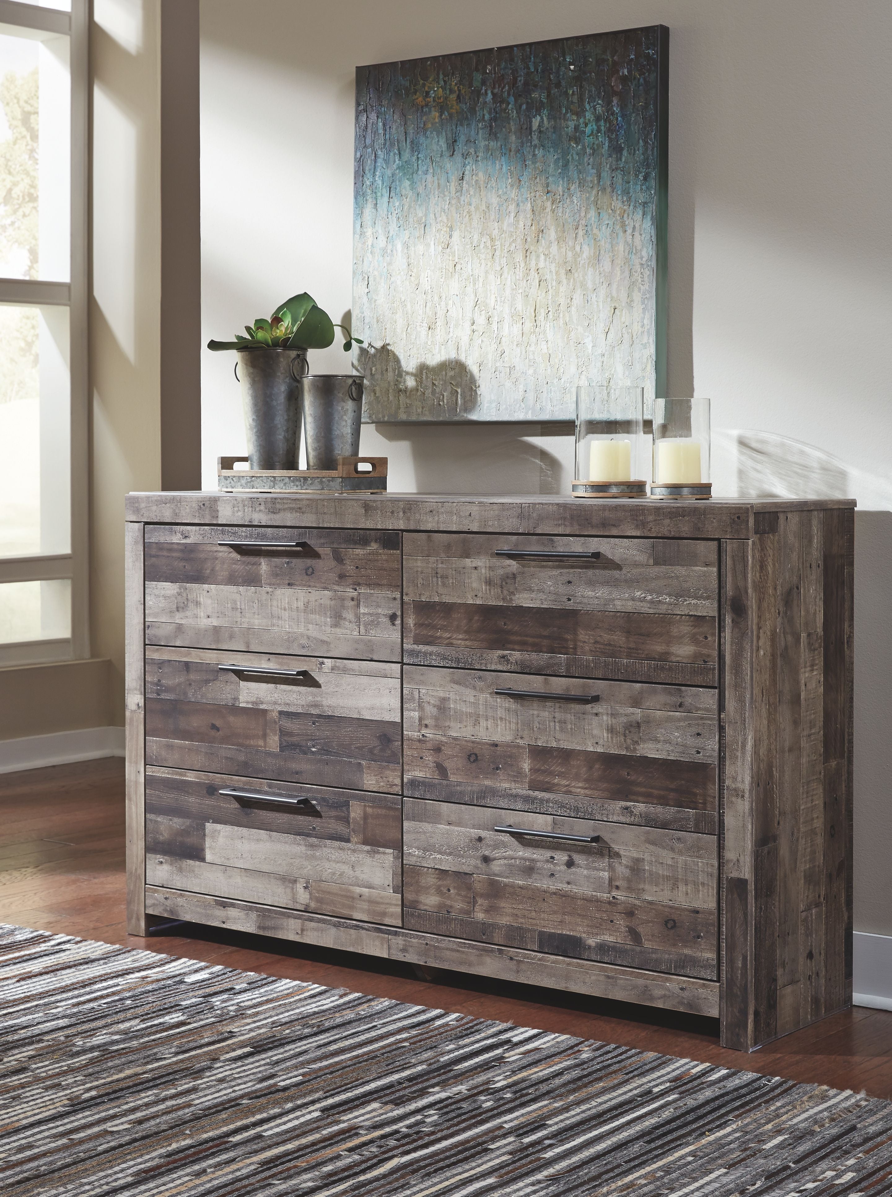 Gray wood dresser with mirror and six drawers, metal bar pulls