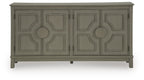 Warm gray accent cabinet front with four paneled doors and circular knob hardware