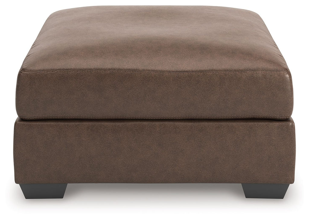 Oversized accent ottoman in dark brown upholstered fabric with low block legs