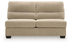 Sand armless loveseat with two-piece backrest, wide seat cushions, dark tapered legs