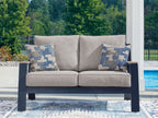 Blue patterned loveseat with gray seat cushions and dark frame