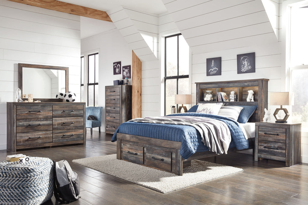 Panel bookcase bed with storage drawers, rustic wood finish, blue bedding